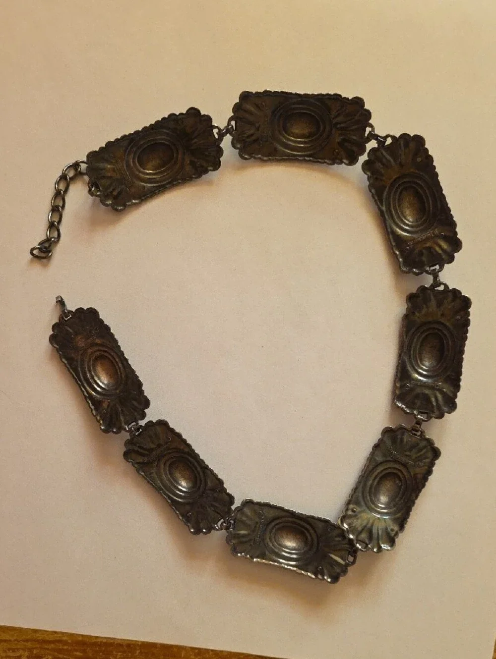 Escada Silver-Tone Ornate Concho Link Oval Belt